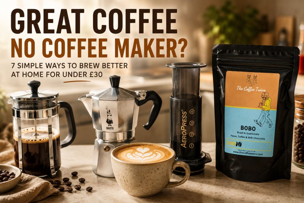 Featured image for a blog about making coffee without a coffee maker. The image shows a warm kitchen countertop with several manual brewing methods, including a French press, moka pot, AeroPress, and a latte with heart-shaped latte art. A bag of The Coffee Twins Bobo coffee sits alongside scattered coffee beans, creating a cosy, café-style scene. Large headline text reads: "Great Coffee, No Coffee Maker? 7 Simple Ways to Brew Better at Home for Under £30." Ideal for guides on home coffee brewing, manual coffee methods, and making café-quality coffee without expensive equipment.