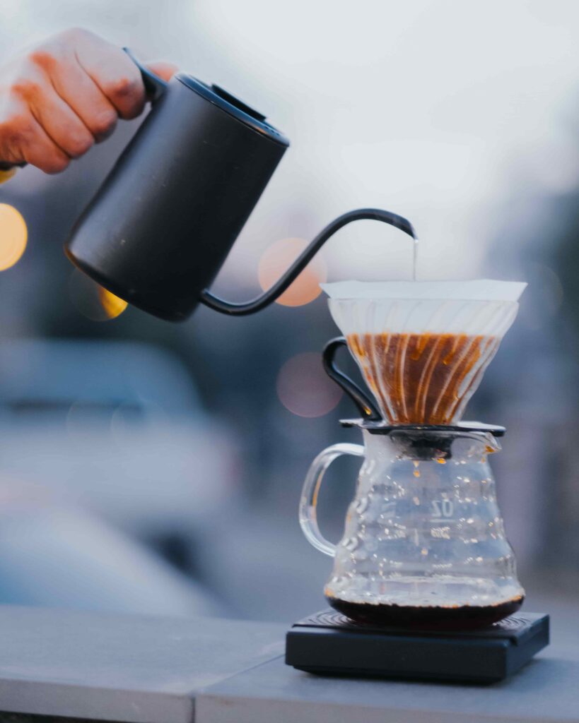 Alt text: Infographic v60” showing a kettle being poured over a v60 pot 