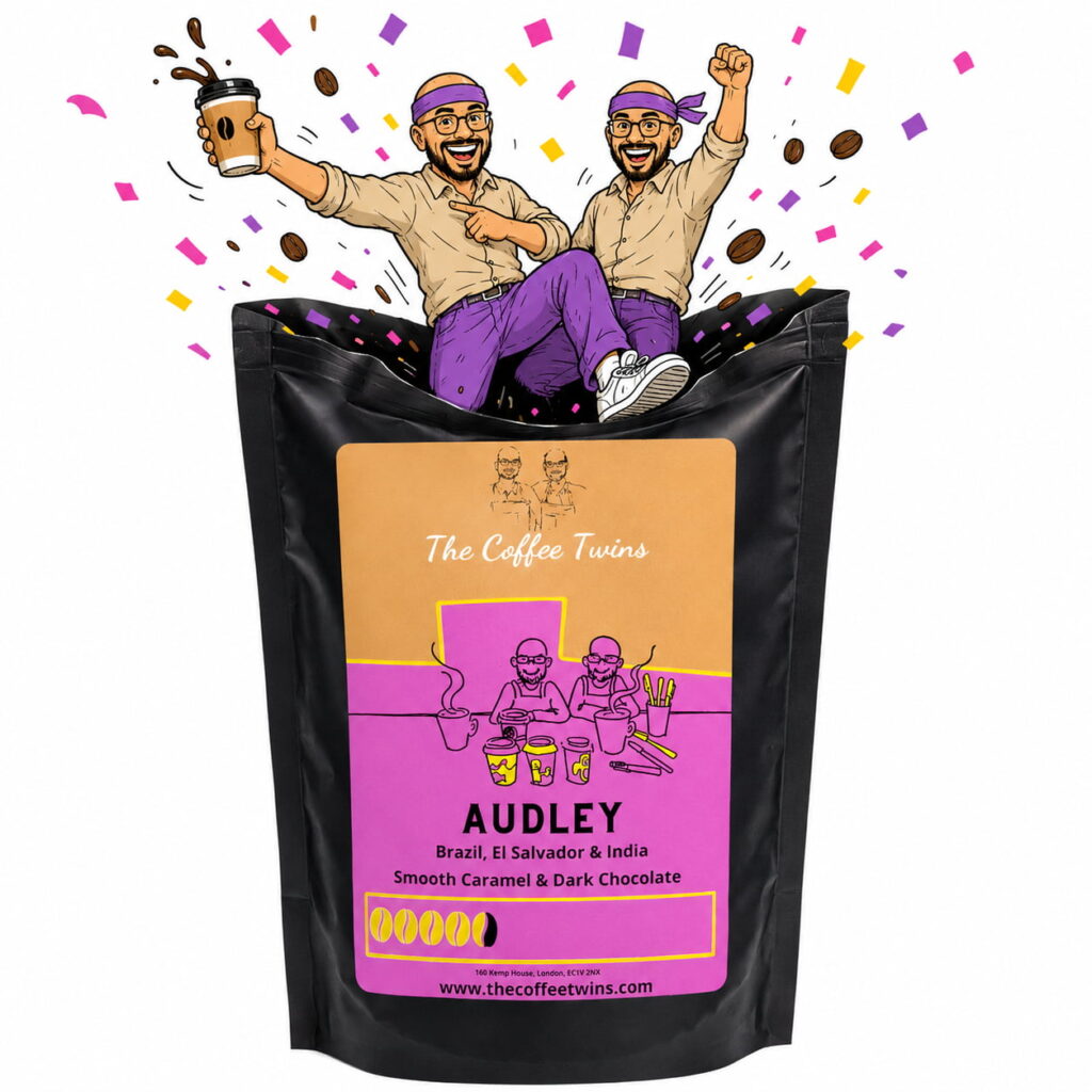 Audley coffee bag with two cheerful coffee characters wearing purple headbands and purple trousers, jumping from the bag with confetti and coffee beans.