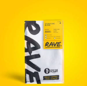RAVE Coffee Signature Blend bag displayed against a bright yellow background, featuring bold black-and-white packaging and “For the Planet” branding.
